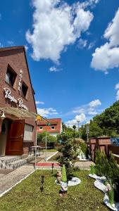 Сад в Hotel Pension Pamina