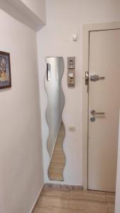 a stairway in a room with a door at Promar La Pineda Port Aventura in La Pineda