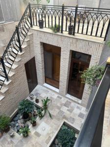 an overhead view of a building with a garden at GUZAL Boutique Hotel in Bukhara