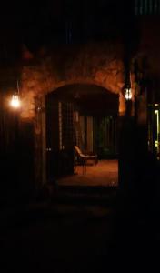 a bench sitting in the middle of a room at night at Cottage by Ranmuduella in Labugama