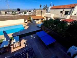 a view of a swimming pool from a house at Villa Thalasena in episkopi-heraklion +34 photos
