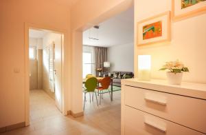 a kitchen and living room with a dining room at Sonnentraum in Zinnowitz