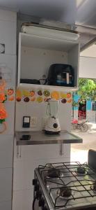 a kitchen with a blender on top of a stove at Casa SAYBER DON DIEGO in Don Diego