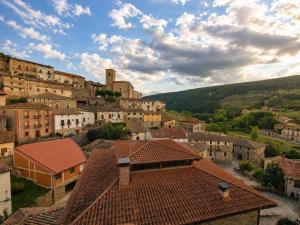 a view of a town with houses and roofs at El Palacito de Villoslada in Villoslada de Cameros