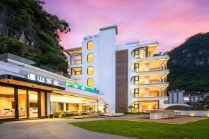 a rendering of the exterior of a hotel at Yulonghe Yushan Country Hotel in Yangshuo