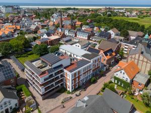 an aerial view of a city with buildings at Arthotel Bakker in Borkum +17 photos
