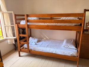 a couple of bunk beds in a room at Thassos Traditional House in Limenaria