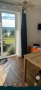 a room with a sliding glass door with a view at Agroturystyka Matłak in Matłak