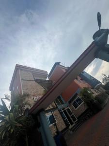 a view of a house from the street at Acactus in Kampala