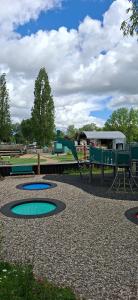 a playground with a slide in a park at Billing Aquadrome , Hailsham 2 Bedrooms, BLP60 in Northampton