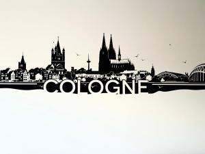eine Illustration einer Stadtsilhouette mit dem Wort Colondon in der Unterkunft Villa Cologne - Apartments & Monteursquartiere in Meckenheim bei Köln in Meckenheim