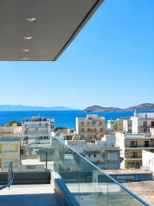 a view of a city from the balcony of a building at Anastasia Karystos in Karistos