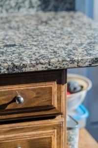 a kitchen counter with a granite counter top at Cantinho do Cávado in Fão +90 photos