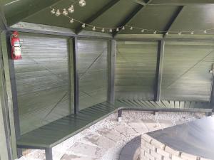 a screened in patio with a table and lights at Holiday Home Calli by Interhome in Give