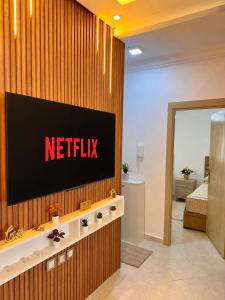 a netflix sign on a wall in a hotel room at Modern Comfort Stay Tanger in Tangier