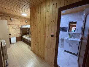 a bathroom with a shower and a sink in a room at EŞ Pansiyon in Uzungöl +78 photos