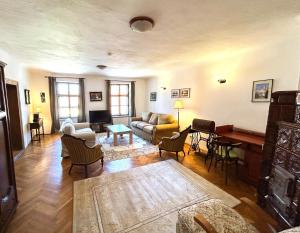 a living room with a couch and a table at Casa Cojo in Sighişoara