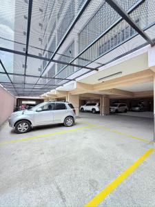 a car parked in a parking lot in a building at Ethanira Homes Ngara in Nairobi