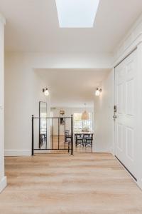 an empty living room with a table and a door at 72 S Orem Upstairs Only in Orem