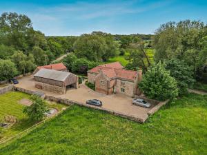 an overhead view of an old house with two cars parked at 3 Bed in Crakehall oc-m30356 in Crakehall