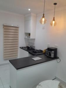 a kitchen with a counter top with a toaster oven at Ultimate Grace in Pretoria