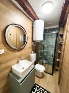 a bathroom with a sink and a mirror at Konoba Stanisic in Balabani +41 photos
