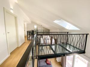 a staircase in a house with a skylight at Apartmani Zora in Primošten