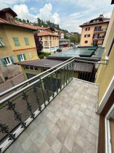 a balcony with a view of a building at Casa Lina in Cavalese