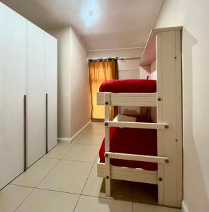 a small room with a bunk bed in a room at Caraceni Apartaments 2 in Castel di Sangro