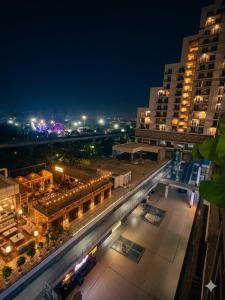 an overhead view of a city at night at Glow Corner in Greater Noida
