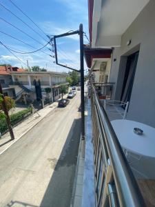 a balcony with a view of a street at Se Soul in Asprovalta