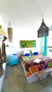 a bedroom with a large bed in a room at Studio Havaí - Village Capixaba in Gravatá