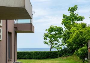 a view of the ocean from a building at Апартаменти Спас 2 in Sinemorets