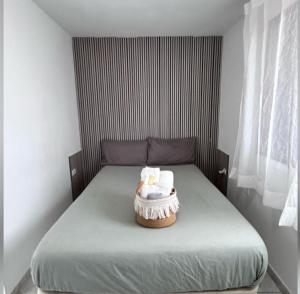 a small bed in a room with atained at La Mar in Los Realejos