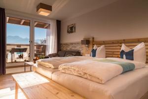 Postel nebo postele na pokoji v ubytování Hotel Christine
