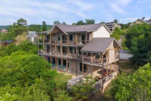 an aerial view of a house in the woods at Splash N Heavenly Views in Gatlinburg
