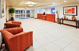 a lobby of a hospital with a waiting room at Holiday Inn Express Hotel & Suites Chehalis - Centralia by IHG in Chehalis +35 photos