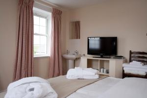 A television and/or entertainment center at Skerrols House 