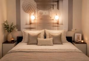 a bedroom with a large bed with pillows and lights at Evergreen Residence VárLak in Debrecen