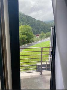 a view of a road from a train window at Aleksberg Club, Dilijan Hotel in Dilijan