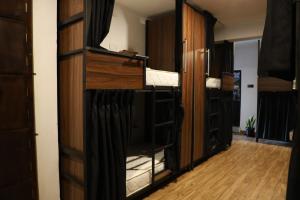 a group of bunk beds in a room at Bunk 7 in Kandy