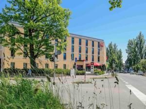 a building on the side of a city street at ibis Konstanz in Konstanz