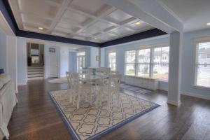 a dining room with a table and chairs at 36967 S. Silver Sands Dr, Bethany Beach in Bethany Beach
