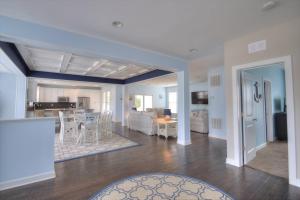 a large living room with a kitchen and a living room at 36967 S. Silver Sands Dr, Bethany Beach in Bethany Beach +42 photos