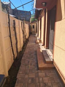 an alley way between two buildings at Casa Roxana in Constanţa