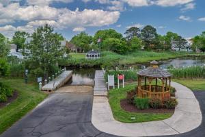 a park with a gazebo and a pond at 11 Mooring La in Millville