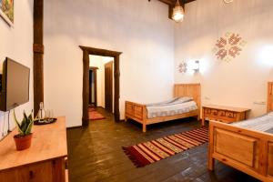 Postel nebo postele na pokoji v ubytování Hotel Skrinya