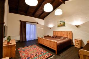 Postel nebo postele na pokoji v ubytování Hotel Skrinya