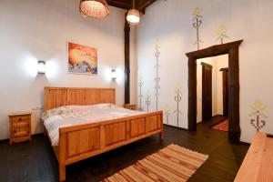 Postel nebo postele na pokoji v ubytování Hotel Skrinya