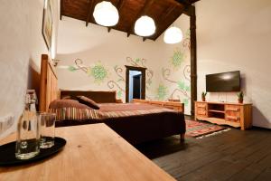 Postel nebo postele na pokoji v ubytování Hotel Skrinya